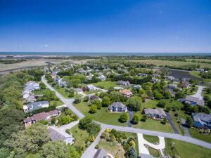 aerial of community near the ocean